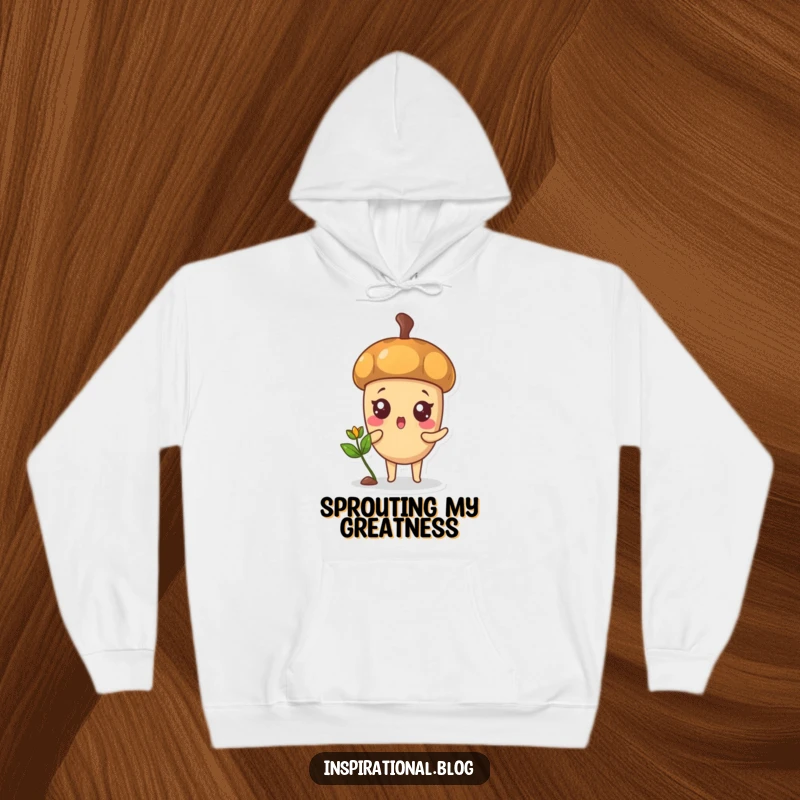 Funny hoodie featuring a surprised acorn character with a tiny, happy sprout, symbolizing potential and warmth.