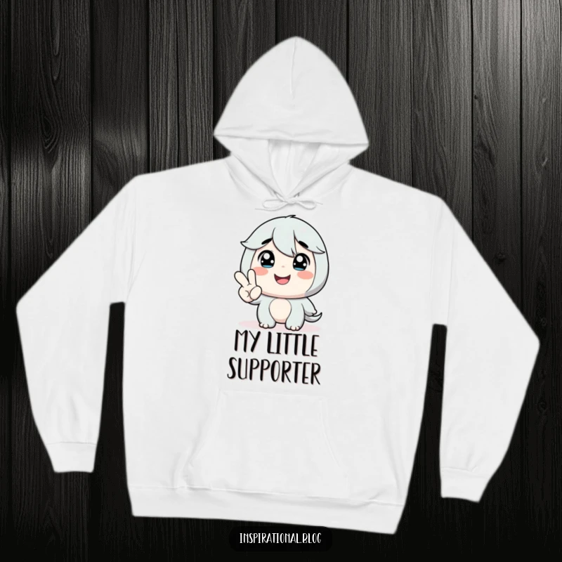 Funny hoodie with a character smiling at a miniature hand offering encouragement, providing a sense of warmth and positive reinforcement.